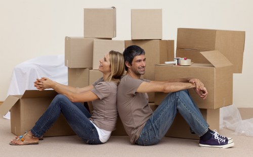 Local moving van and team planning a property access route