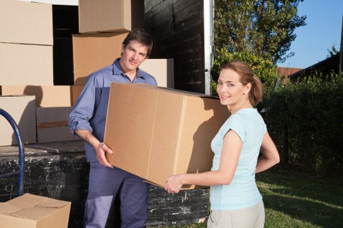 Packed boxes and removal equipment ready for moving day